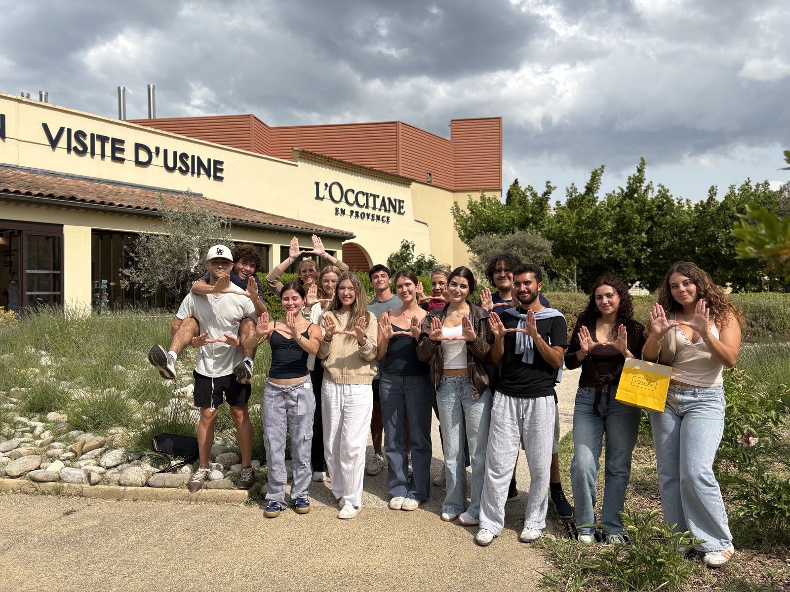 Students outside the L'Occitane en Provence factory